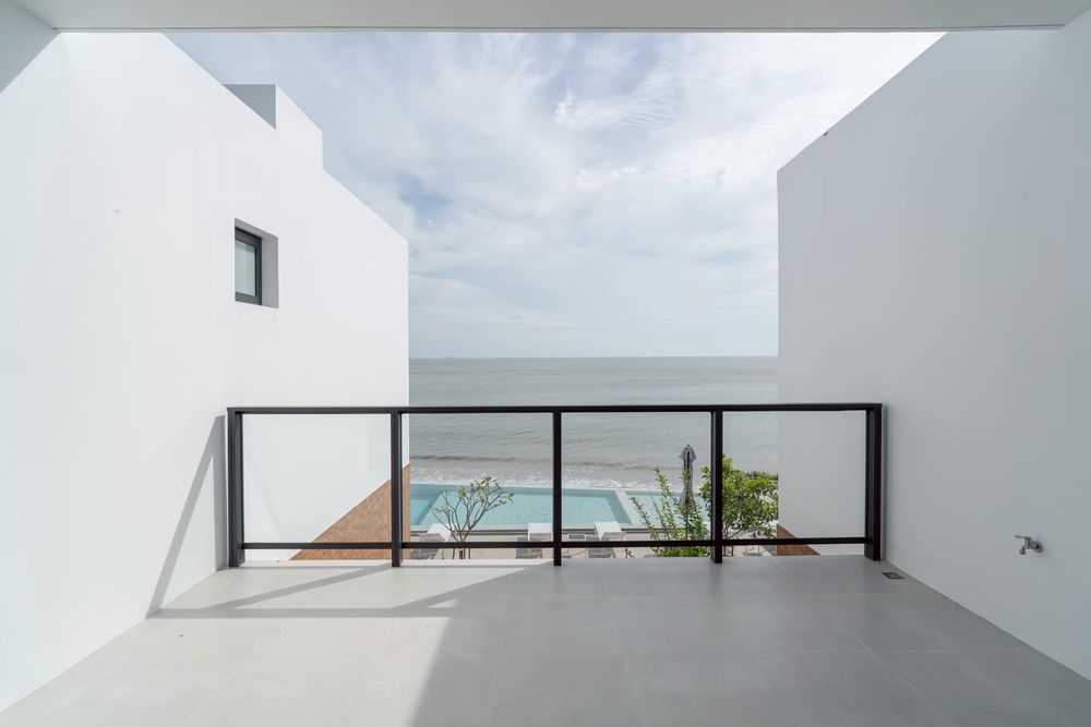 Terrace looking over the pool to the sea